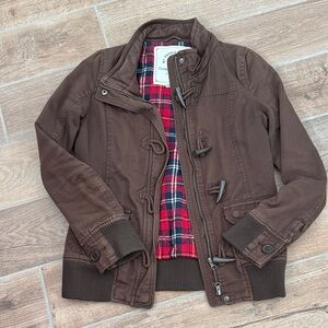 Zenana Outfitters Brown Jean Jacket with Red Plaid Lining and cool buttons!